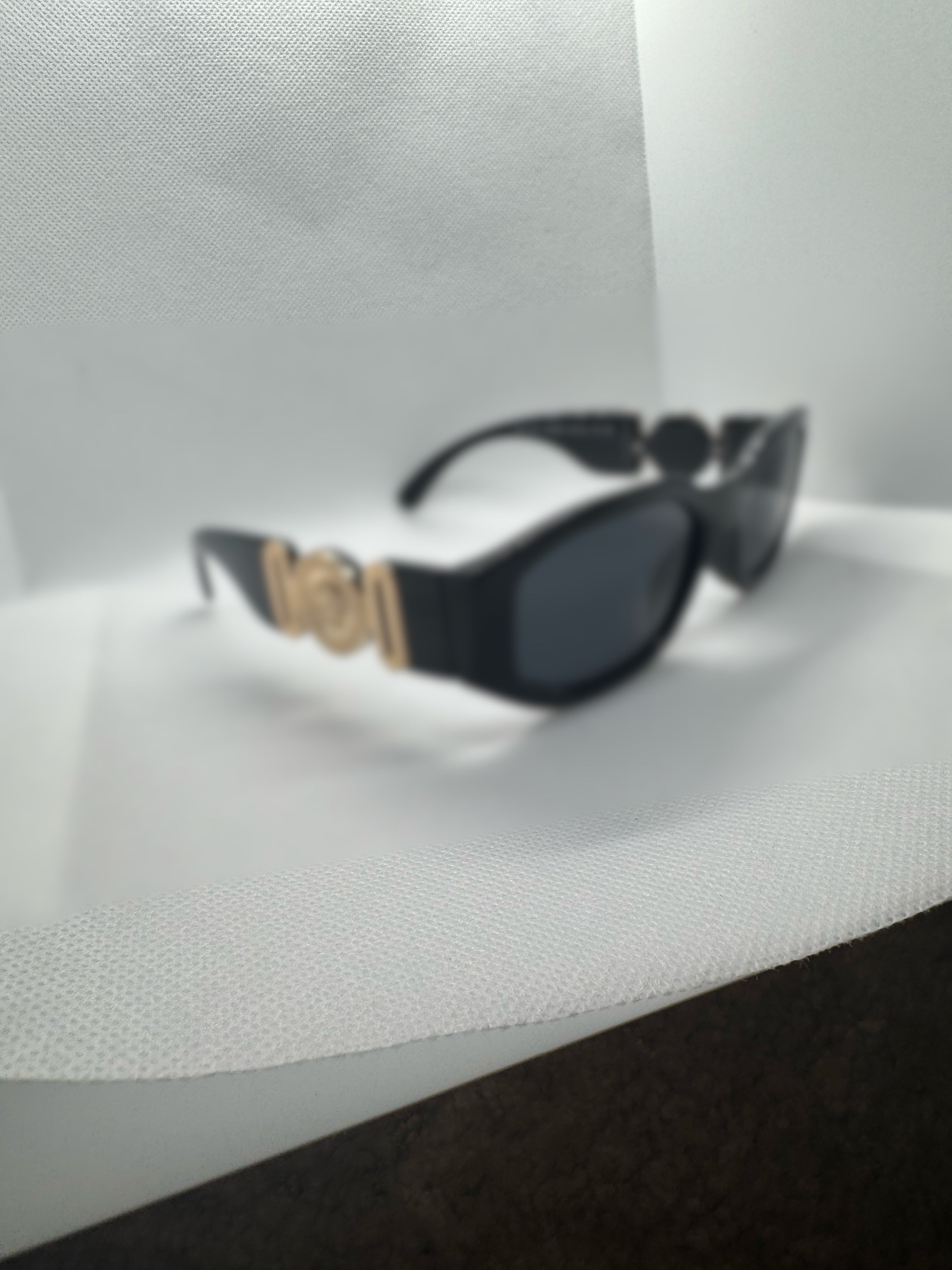 DESIGNER SUNGLASSES